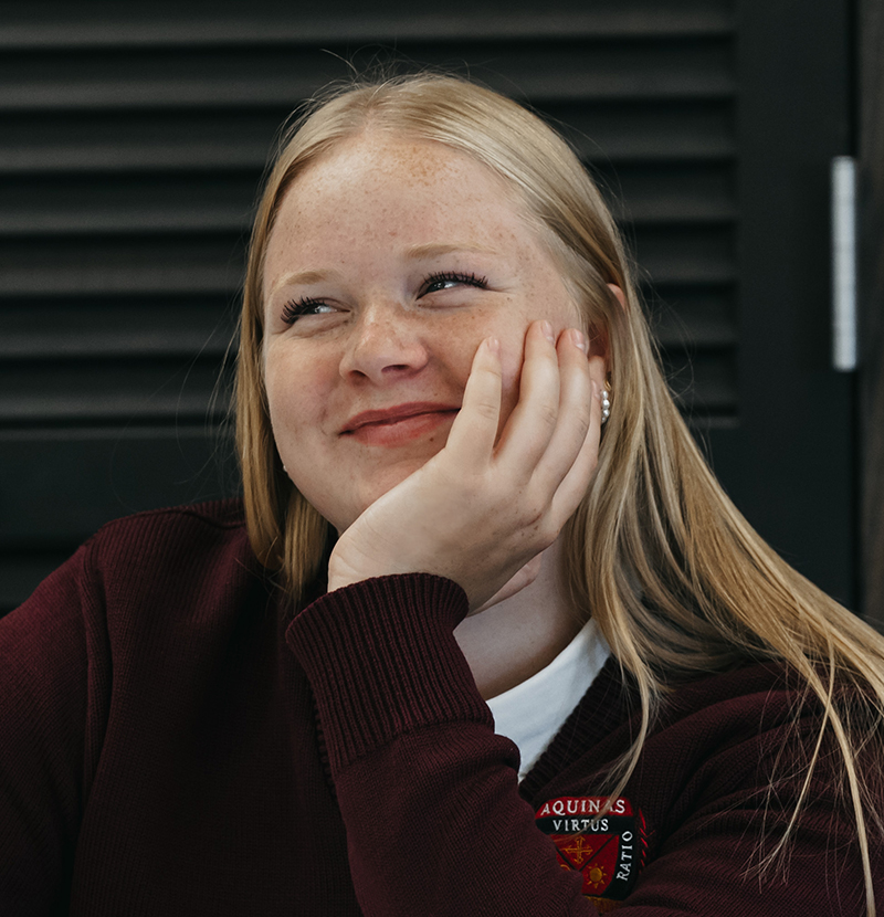Student smiling in class